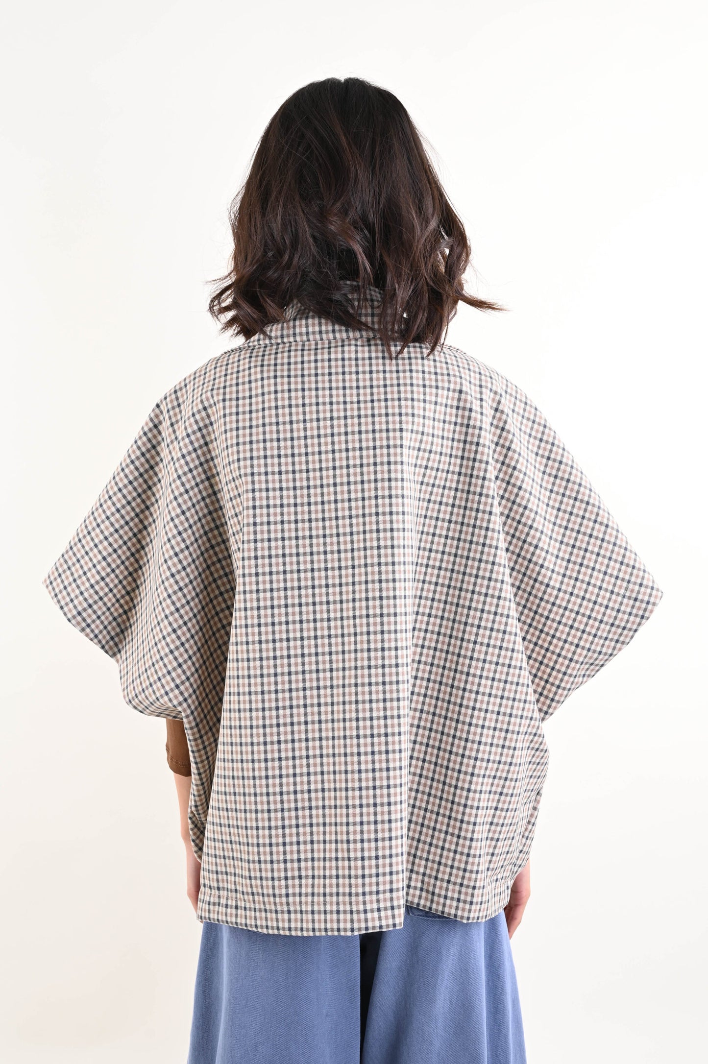 TRENCH CROP SENZA MANICHE A QUADRI